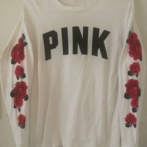 VS PINK LONG SLEEVE WHITE SHIRT W/RED ROSES GOING DOWN ON EACH SLEEVE  O/S. M